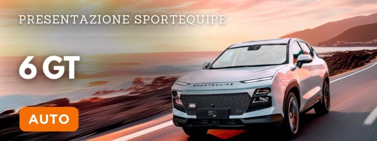 Veduta esterna della Sportequipe 6 GT auto di colore grigio chiaro metallizzato con nello sfondo il mare al tramonto Trovala da Reduzzi Motor a Treviglio